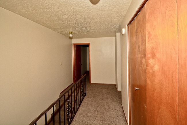 Building Photo - 2 bedroom 1.5 bath with a carport & backyard