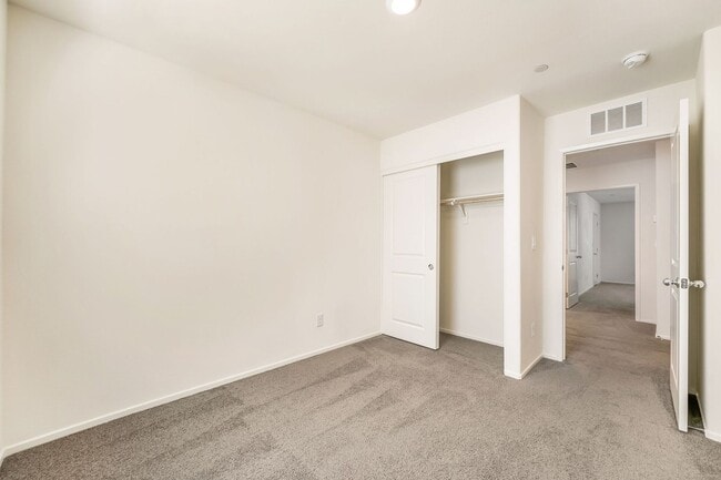 Building Photo - Modern West Henderson Townhome with Sleek Upgrades & Smart Home Features!