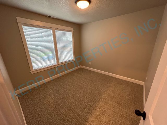 Building Photo - 3 bd / 2.5 Bth - Gas Fireplace - Central A/C - Attached Garage - Pet Friendly!