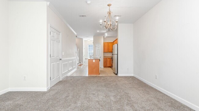 Building Photo - Located just Steps from Shopping, Dining, & Entertainment in The Market Common