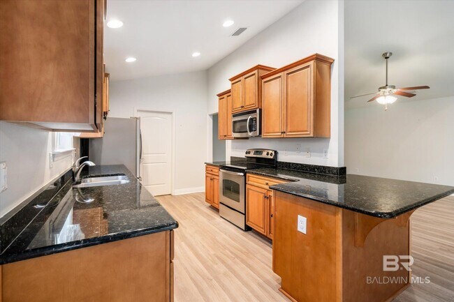 Building Photo - 9534 Woolrich Ave
