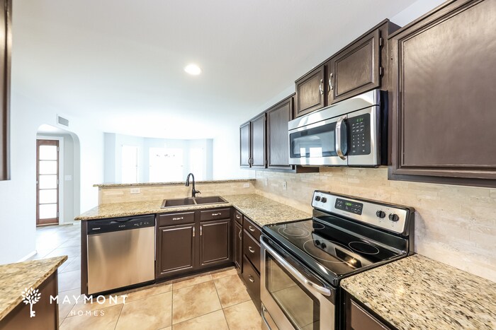 Building Photo - 7712 W Behrend Dr
