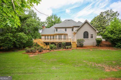 Building Photo - 9485 Nesbit Lakes Dr