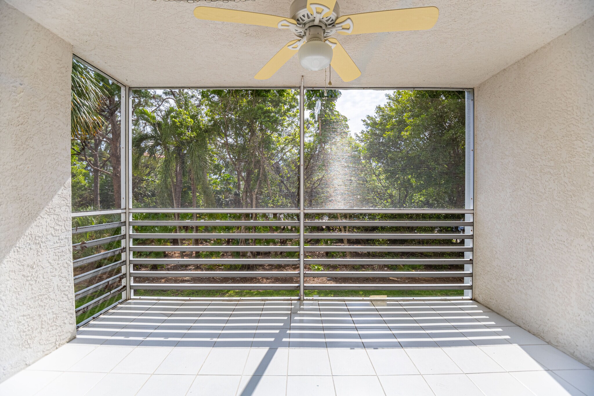 SCREENED LANAI WITH WEST EXPOSURE - 290 Naples Cove Dr