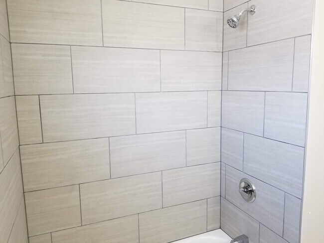 Building Photo - Spacious 5-Bedroom Magna Home with Deck and Ample Parking
