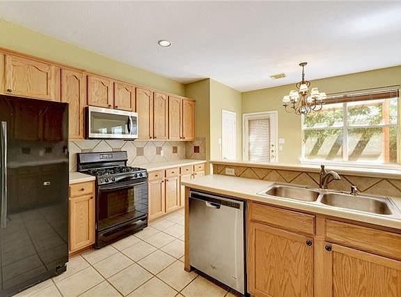 Building Photo - 8003 Magic Mountain Cove