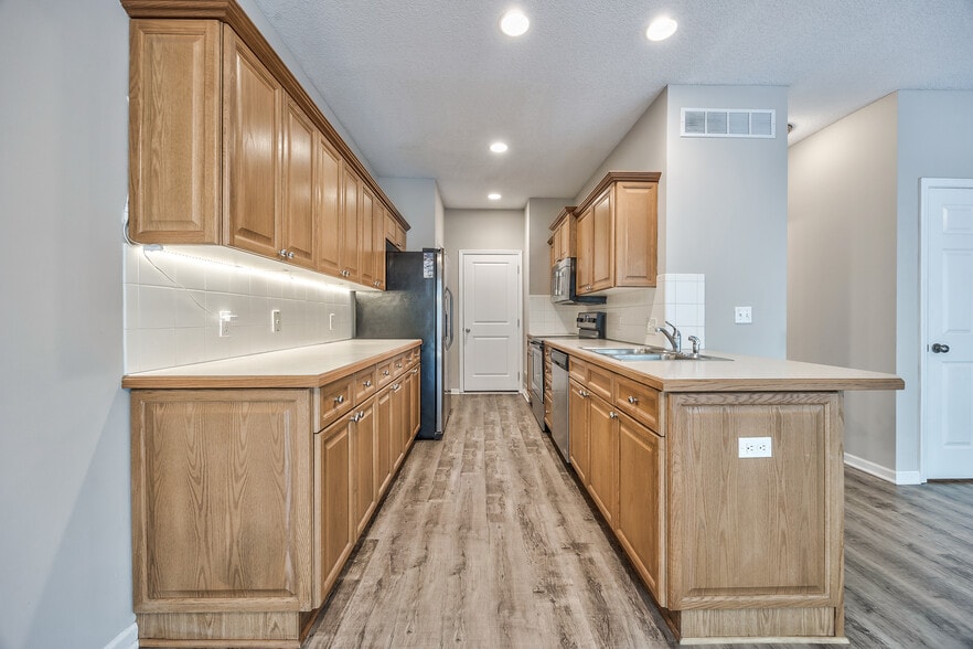 Kitchen has easy access to garage - 22810 West 71st Terrace