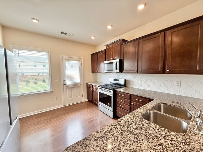 Building Photo - Spacious 4BD, 3BA Durham Home in a Prime Location Near Duke University, RTP, and RDU Airport