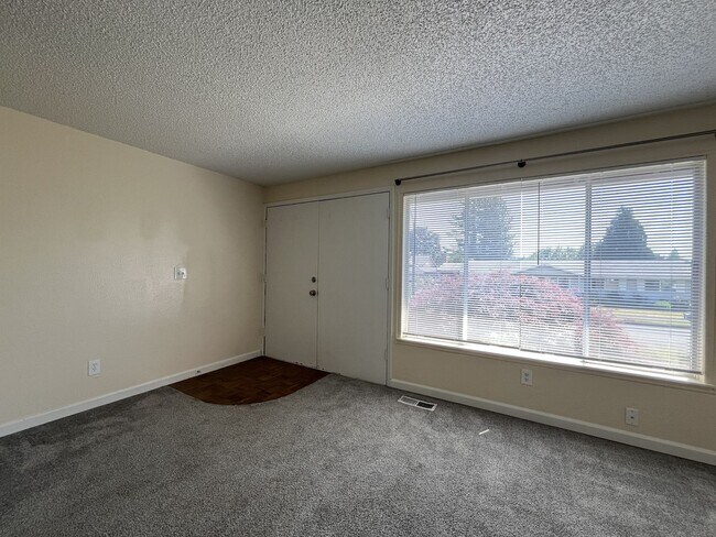 Building Photo - Charming Ranch Home with Sunroom or 4th Bedroom, Two-Car Garage and Fenced Backyard