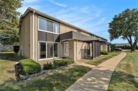 Building Photo - 8691 Kennedy Cir N