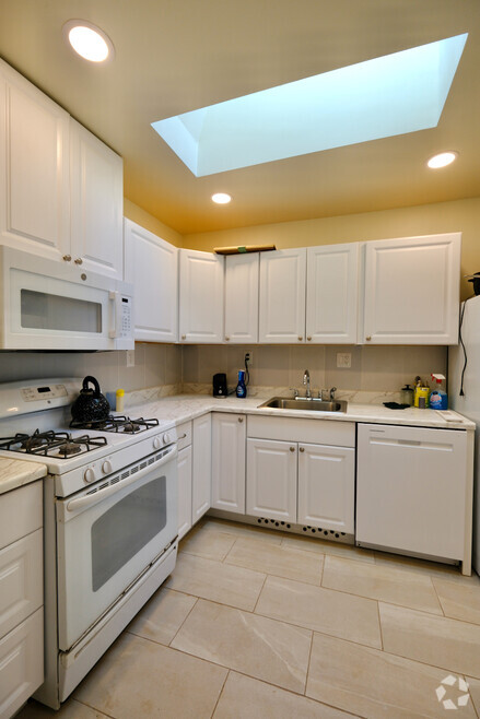 Kitchen with a skylight - 227 1/2 E Victoria St