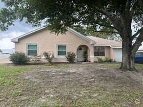 Building Photo - 3 bedroom, 2 bathroom home in Palm Bay wit...