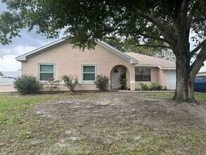 Building Photo - 3 bedroom, 2 bathroom home in Palm Bay wit...
