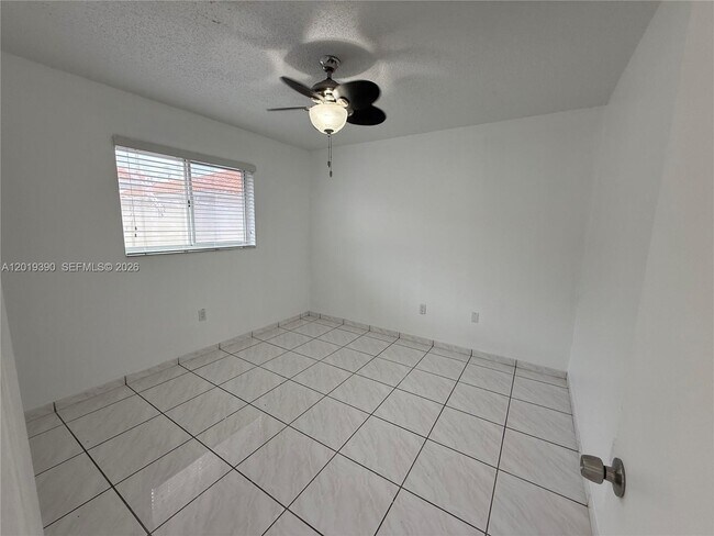 Building Photo - 10101 W Okeechobee Rd