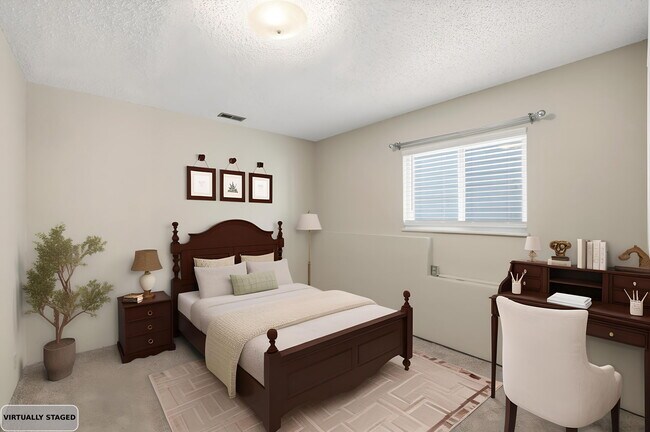 Building Photo - PRICE REDUCED $200/Mo | 4 Bed 2.5 Bath Home w/ Walkout Basement