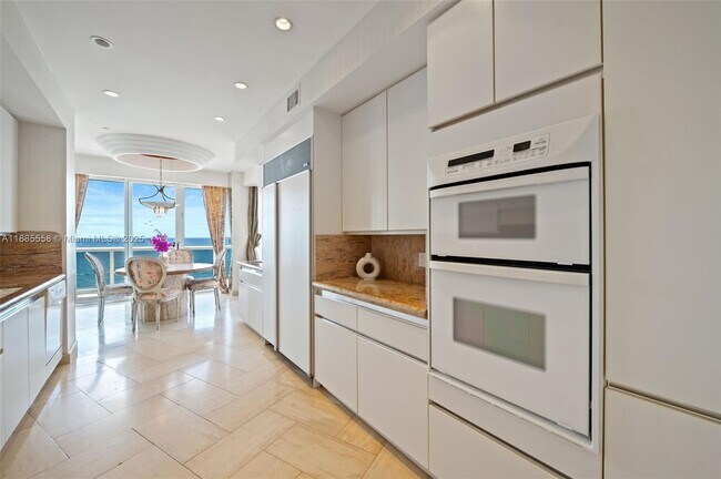 Building Photo - 9601 Collins Ave