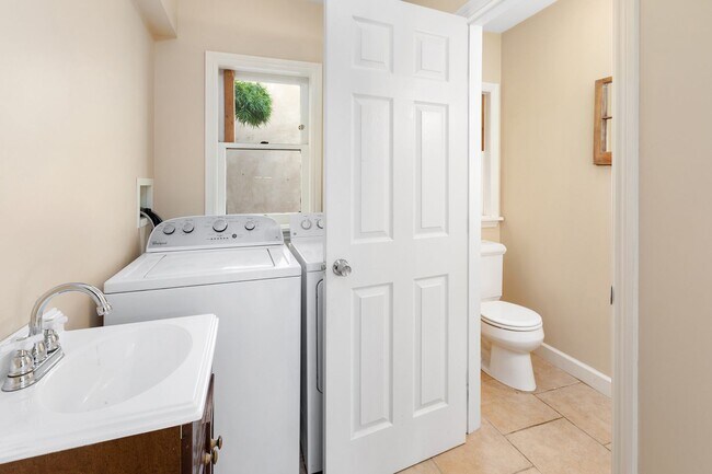 Building Photo - Forest Hill: Bright Updated Single Family Home with Garage, Backyard & Storage