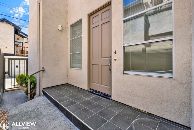 Building Photo - Spacious Coastal Condo with Rooftop Ocean ...