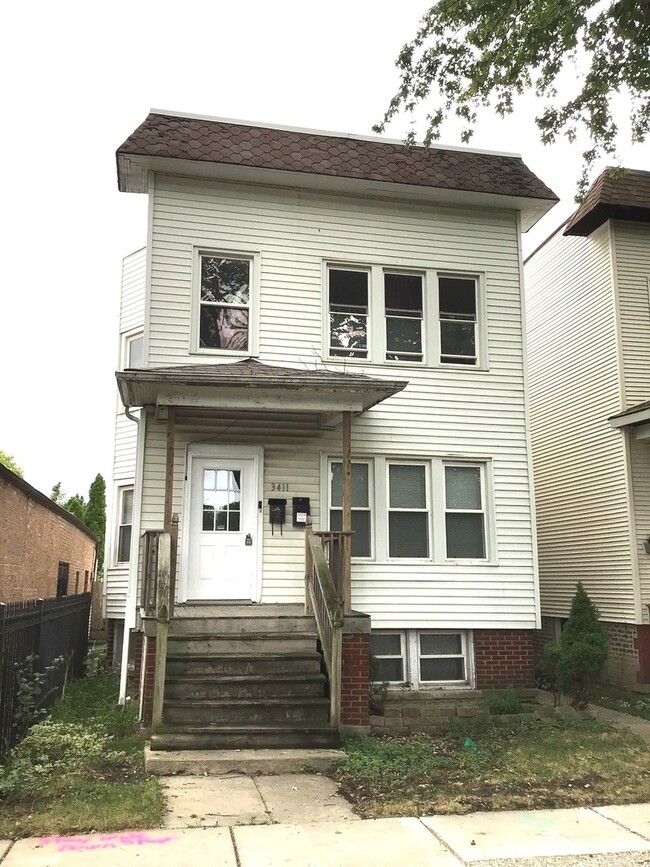 Building Photo - 3411 N Lowell Ave