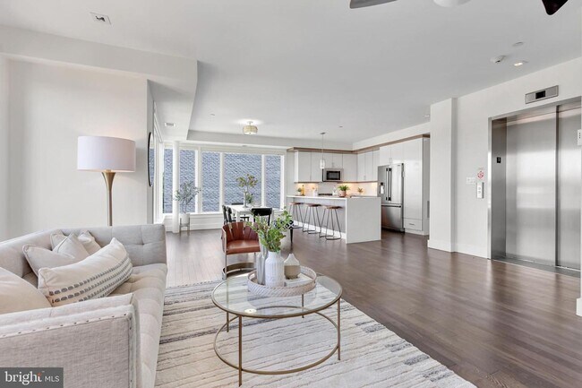 Building Photo - Sunny & Spacious NoMa penthouse with off-s...