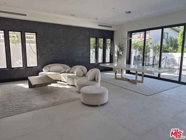 Building Photo - 5299 1/2 Crebs Ave