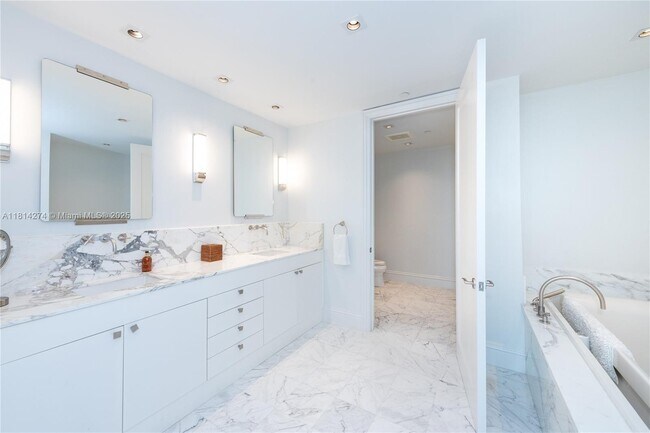 Building Photo - 10295 Collins Ave