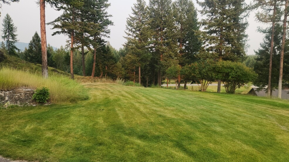 Irrigated front lawn - 6710 Farm To Market Rd