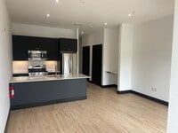 Building Photo - Stylish Studio Apartment | Watermark, Down...