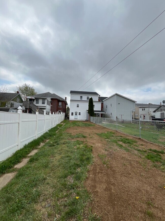 Building Photo - A real stunner! The full renovation is the first thing you'll notice..