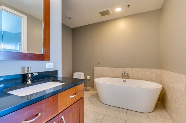 Building Photo - Iconic Strip-View Luxury | Elegant 1BR + Den High-Rise Residence