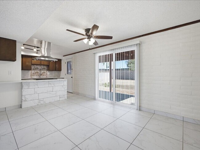 Building Photo - Concept Living with Large Enclosed Backyard & Modern Upgrades!