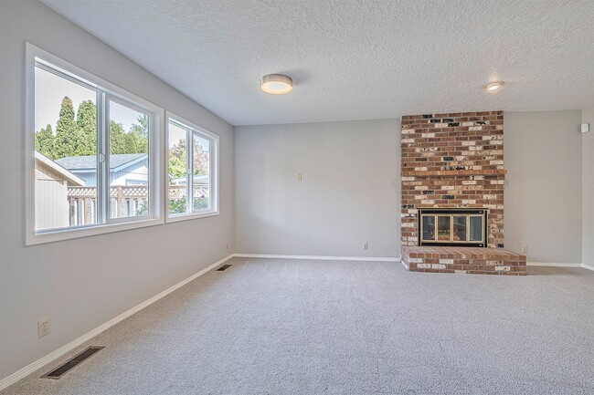 Building Photo - Spacious 5-Bedroom Home with Beautiful Bac...