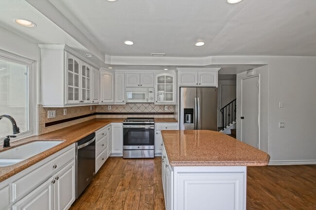 Building Photo - Bright & Spacious, 4BR3BA Home in the Private, Gated Community w/ 2 Pools, Clubhouse, Playground ...