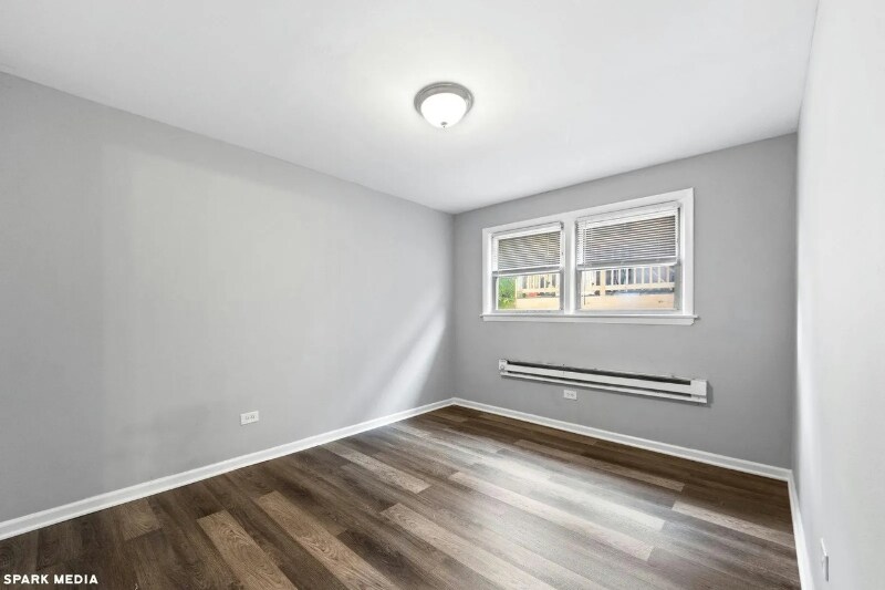 Building Photo - 7617 S Colfax Ave