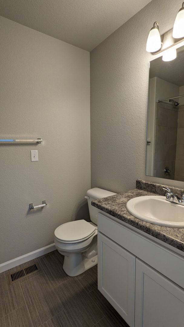 Building Photo - NEWER END UNIT TWO STORY TOWNHOME WITH A/C...
