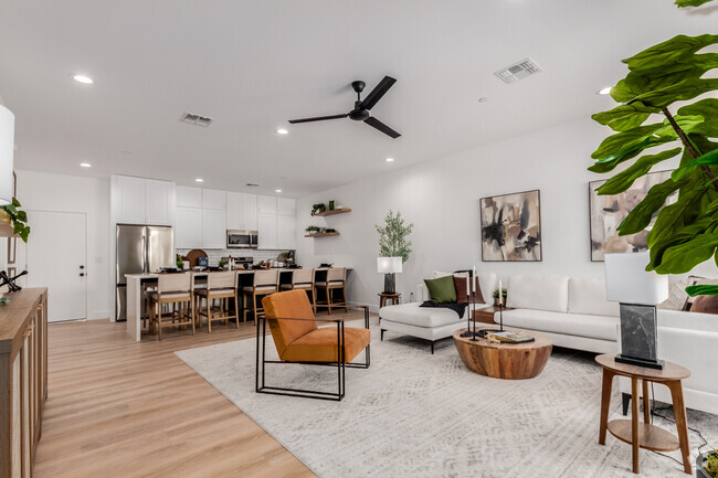 View from front door; living room and kitchen - The CJ Luxury Townhomes