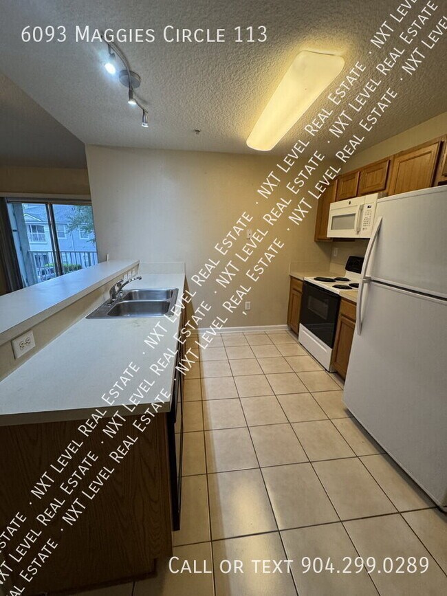 Building Photo - 6093 Maggies Cir