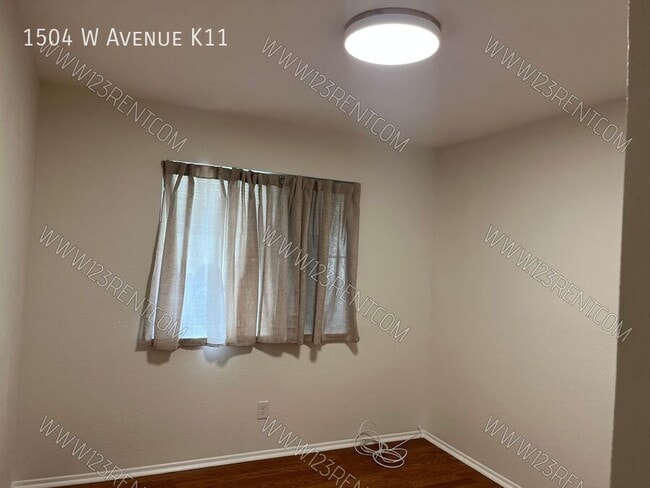 Building Photo - 1504 W Ave K11