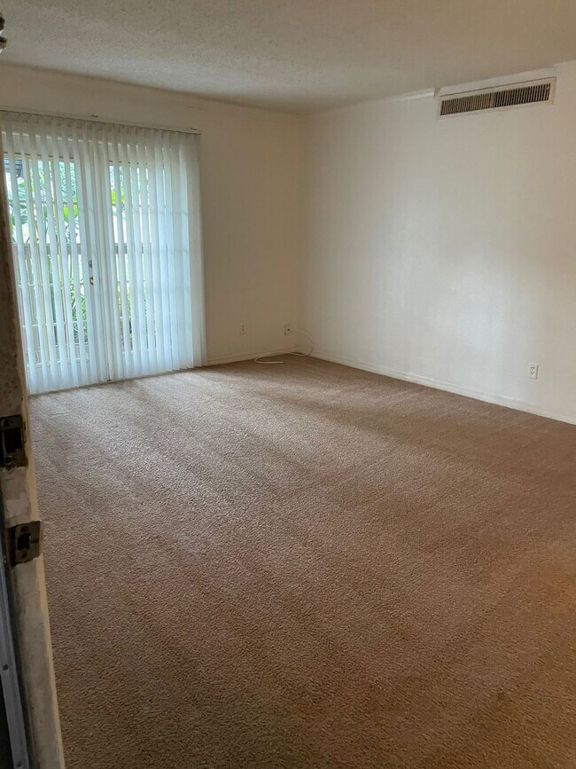 Building Photo - Ground Floor Two bedroom condo