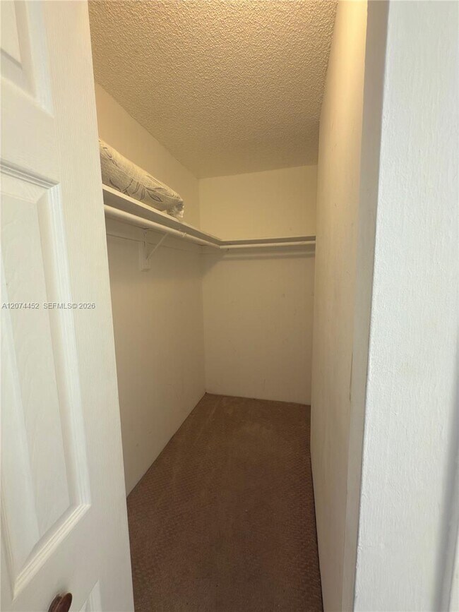 Building Photo - 3675 N Country Club Dr
