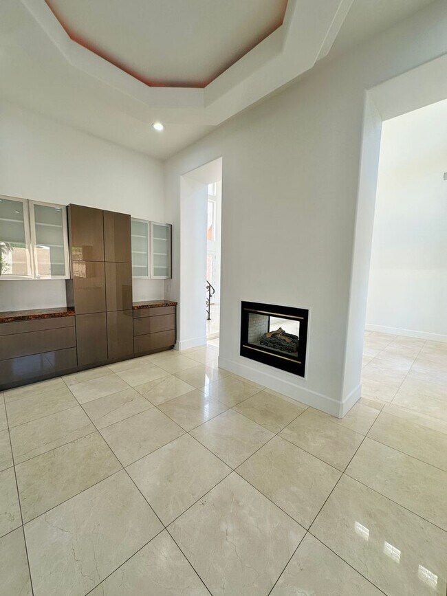 Building Photo - Stunning home with pool in prestigious Eagle Hills!