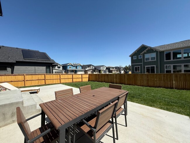 Building Photo - Stunning Luxury Living in Coal Creek with ...