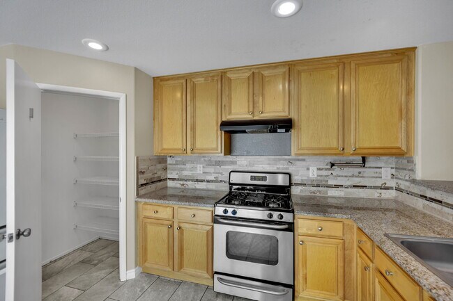 Building Photo - LOCATION IS KEY FOR SHOPPING AND SOCIALIZING