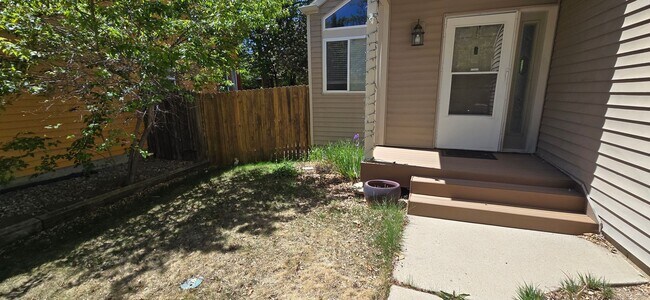 Building Photo - Charming 4-Bed Home in Louisville features bright, open living space, with open deck & garden!