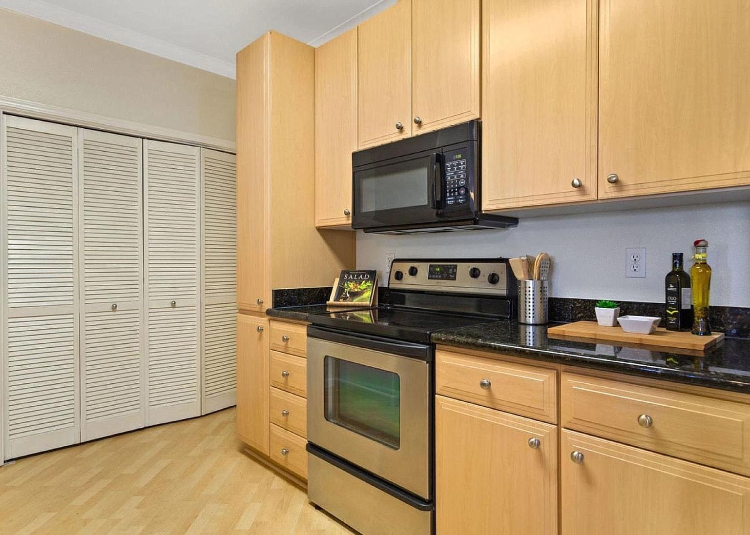 Kitchen Washer & dryer behind doors - 801 S Winchester Blvd