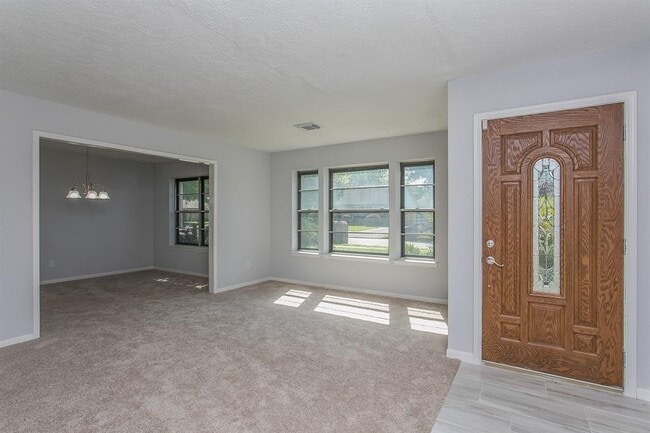 Building Photo - Beautifully renovated 4 bedroom home in a great subdivision