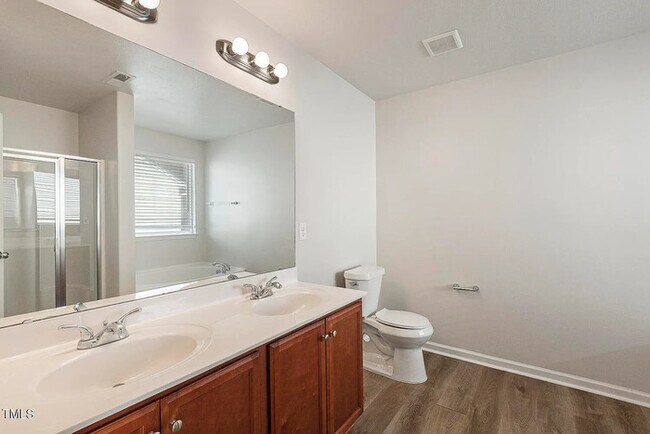 Building Photo - Earn Wealth While Leasing - Like a Homeown...