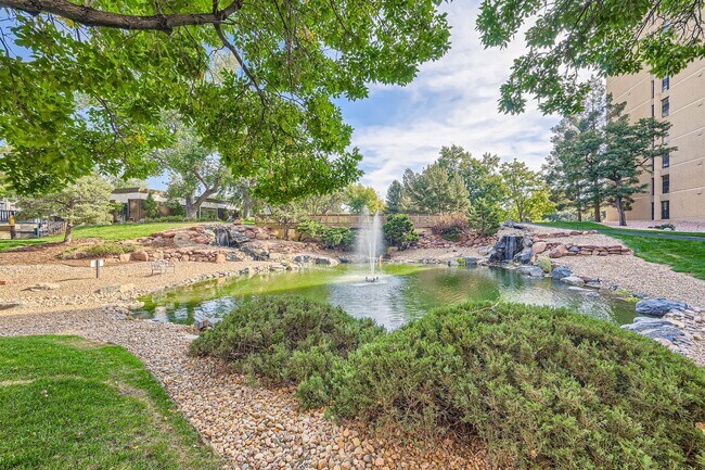 Building Photo - Completely Updated 2 Bedroom 2 Bathroom Condo Available NOW! Garage Parking Included!