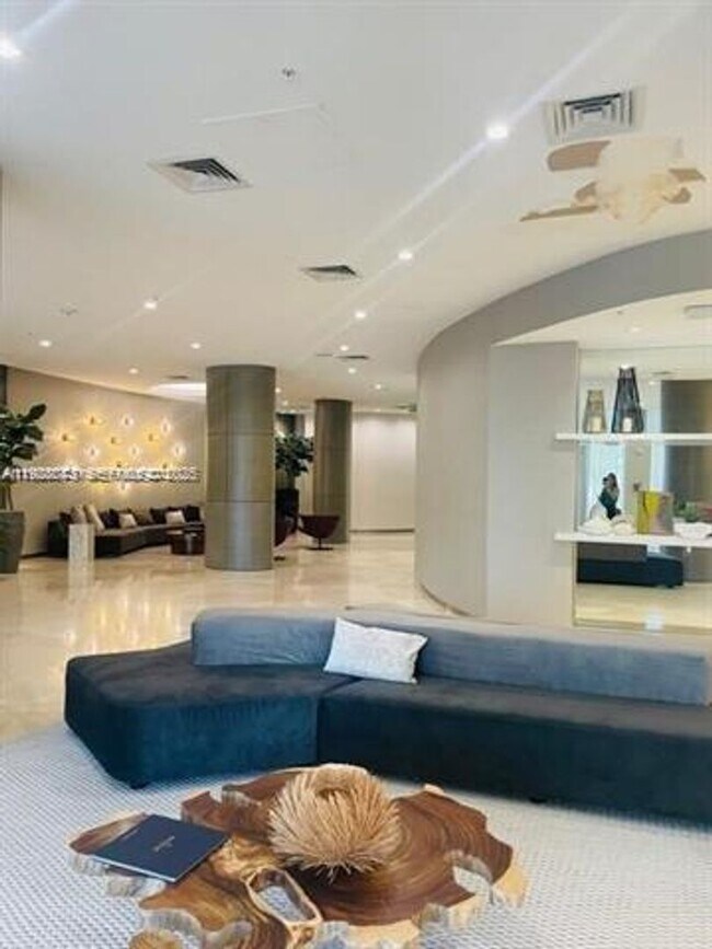 Building Photo - 10275 Collins Ave