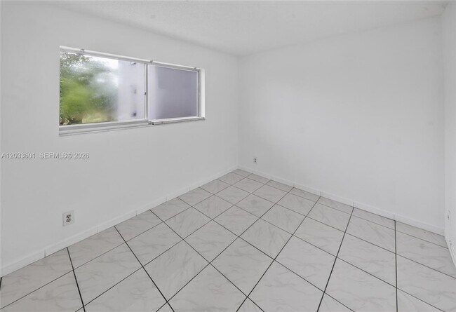 Building Photo - 8750 N Sherman Cir